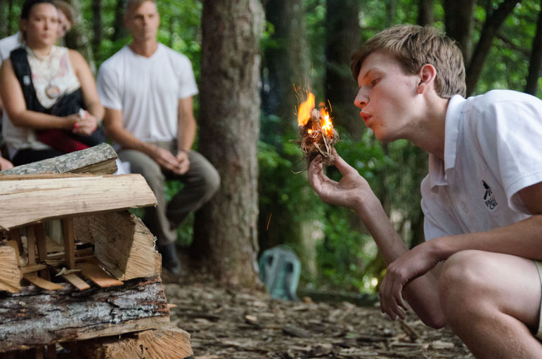 James, who became a Keeper of the Flame last summer, is shown here starting a Sunday evening Campfire from a bow drill method