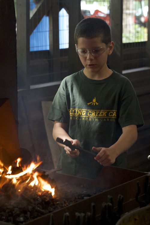 Patton heating up his iron in the coals