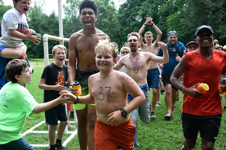 Reaching the finish line of the annual Ironman is always an accomplishment! This triathlon is one of our special events hosted during Main Camp.