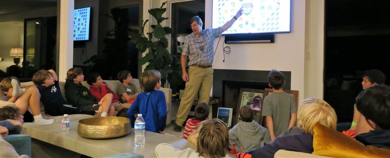 Yates discussing the Waypoints system at camp