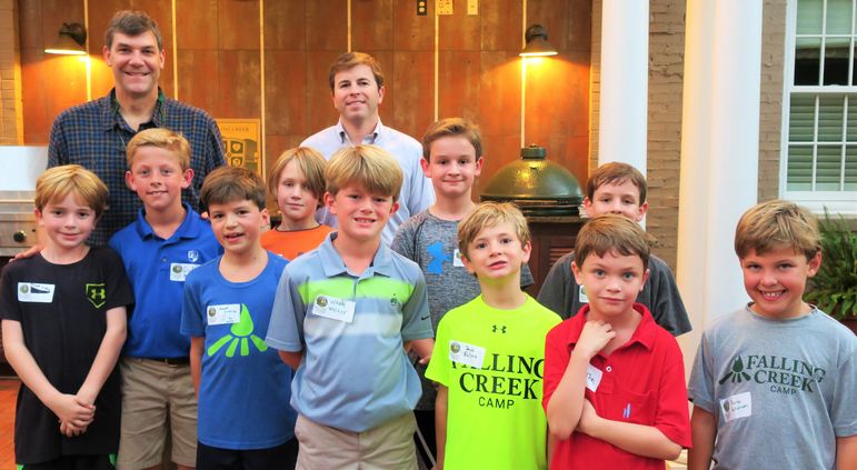 The boys paused momentarily to pose for a group shot.