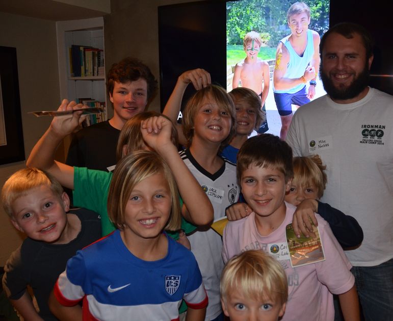 5-year staff member Mike Nuckles is surrounded by happy FCC campers. Mike, who has been teaching and coaching for a few years, is about to sit for the LSAT and then go to law school.