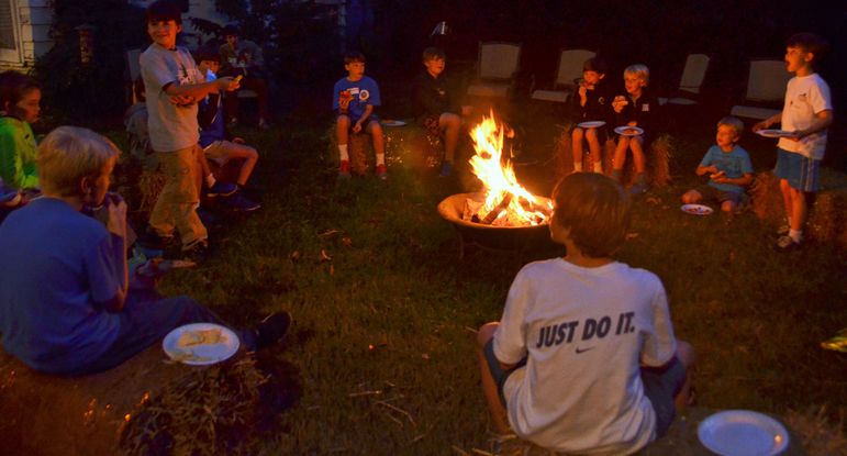 The Gettys’ set up a wonderful campfire area in their back yard where the boys enjoyed eating and hanging out with each other in this perfect camp type setting.