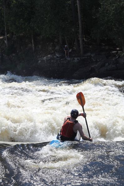 Henry Mentz, from Houston, TX, about to meet a large wall of foaming water.