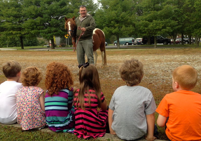 Simon introducing Skittles to to the kids.