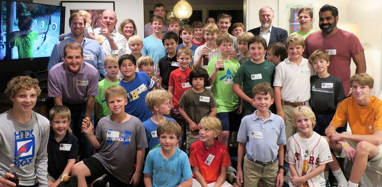 FCC staff, the dads who are FCC alumni, and those that have attended the Father/Son Weekends, joined the boys in the Houston group photo