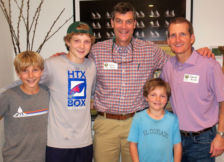 Yates with Carleton Riser and his 3 boys, Mac (left), Robert, and young Carleton.