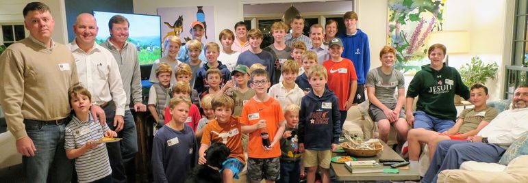 Dads who have attended the Father/Son Weekend and FCC alumni joined the boys for a fun group photo at the Riser’s home in Houston