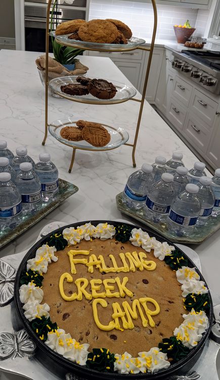 Shae Uden and Cory Savoie offered some delicious dessert that, not surprisingly, disappeared when the boys arrived.