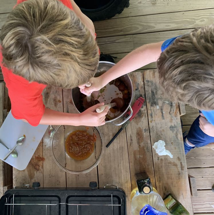 Now for the fun part: mashing the tomatoes!