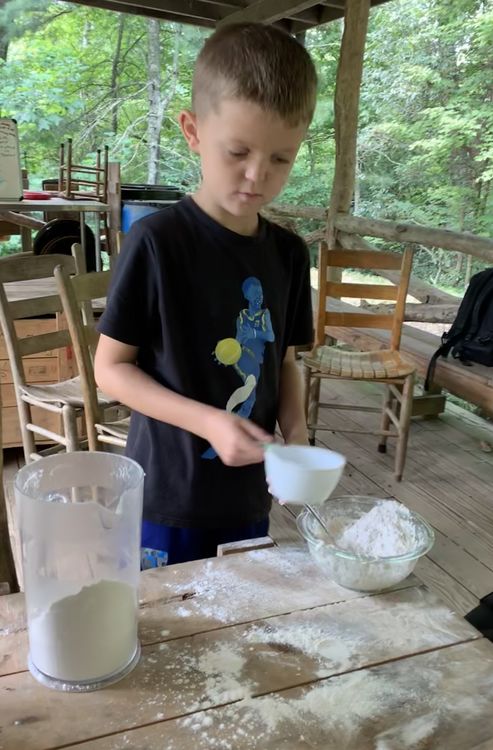 Jack mixing flour, salt, and water to make the simple dough