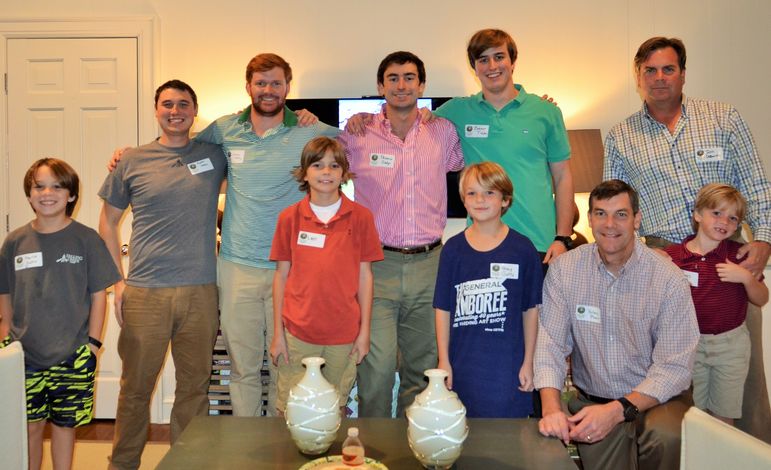 Campers, Staff, and dads who attended a Father/Son Weekend paused to have their photo taken before they watched the new camp video.