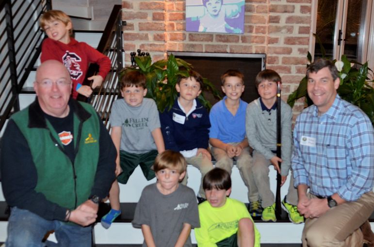 The boys paused momentarily for a photo. Curt Furtado, Major, USMC Retired, and a native of Waynesville, NC, is an alumni of Falling Creek and came to the big event tonight to reconnect. He had received his new copy of the