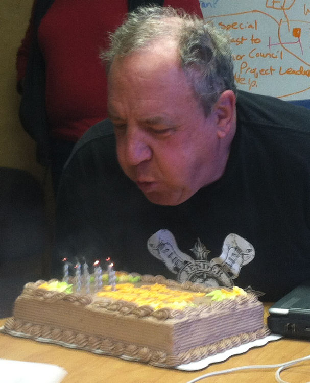 Col. Scotty blowing out the candles on his birthday cake